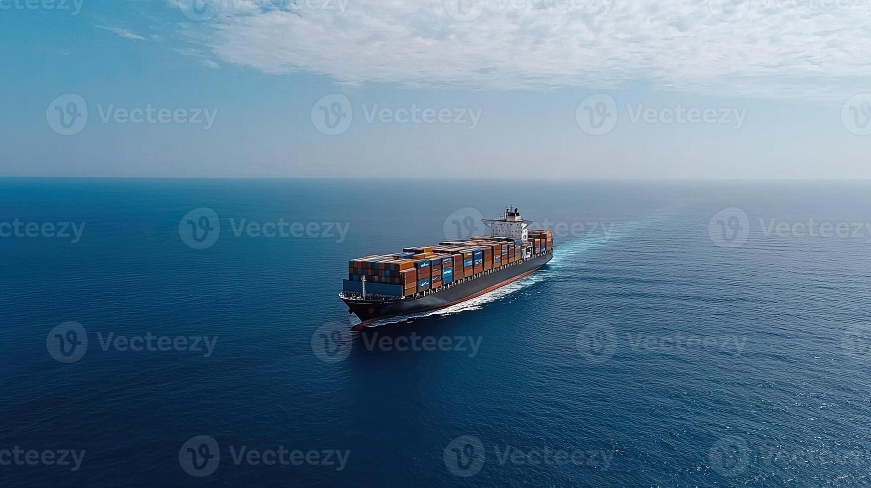 A container ship traveling across the ocean photo