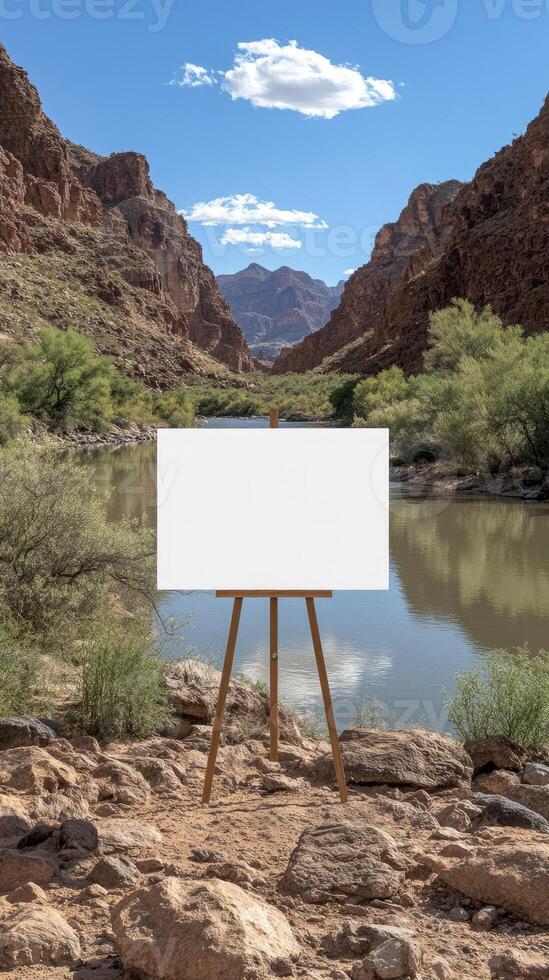 A blank easel with a river in the background photo