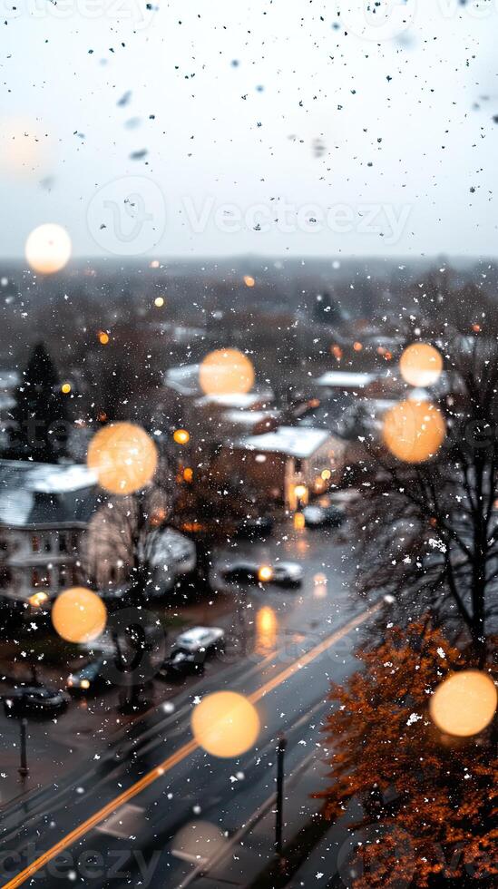 A view of a city street with snow falling on it photo