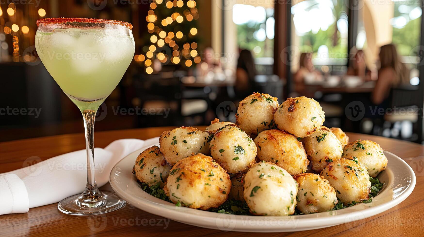 A plate of food with a drink on a table photo