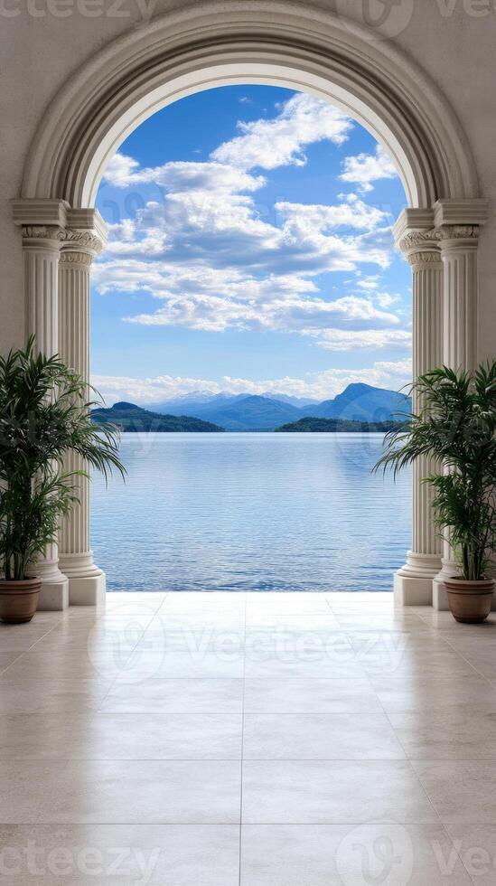 An archway leads to a large room with a view of the water photo