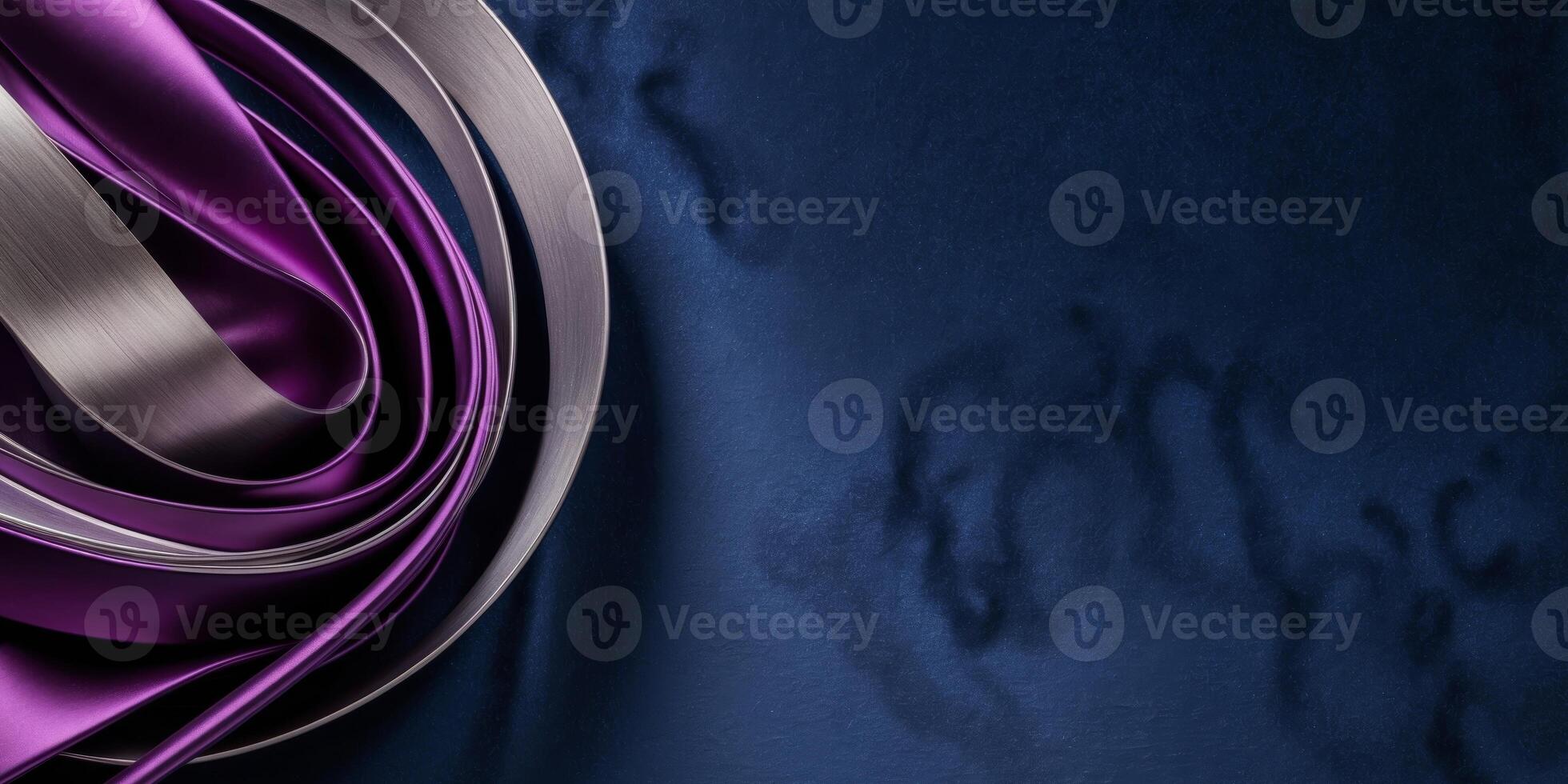 A purple and silver fabric with a spiral design photo