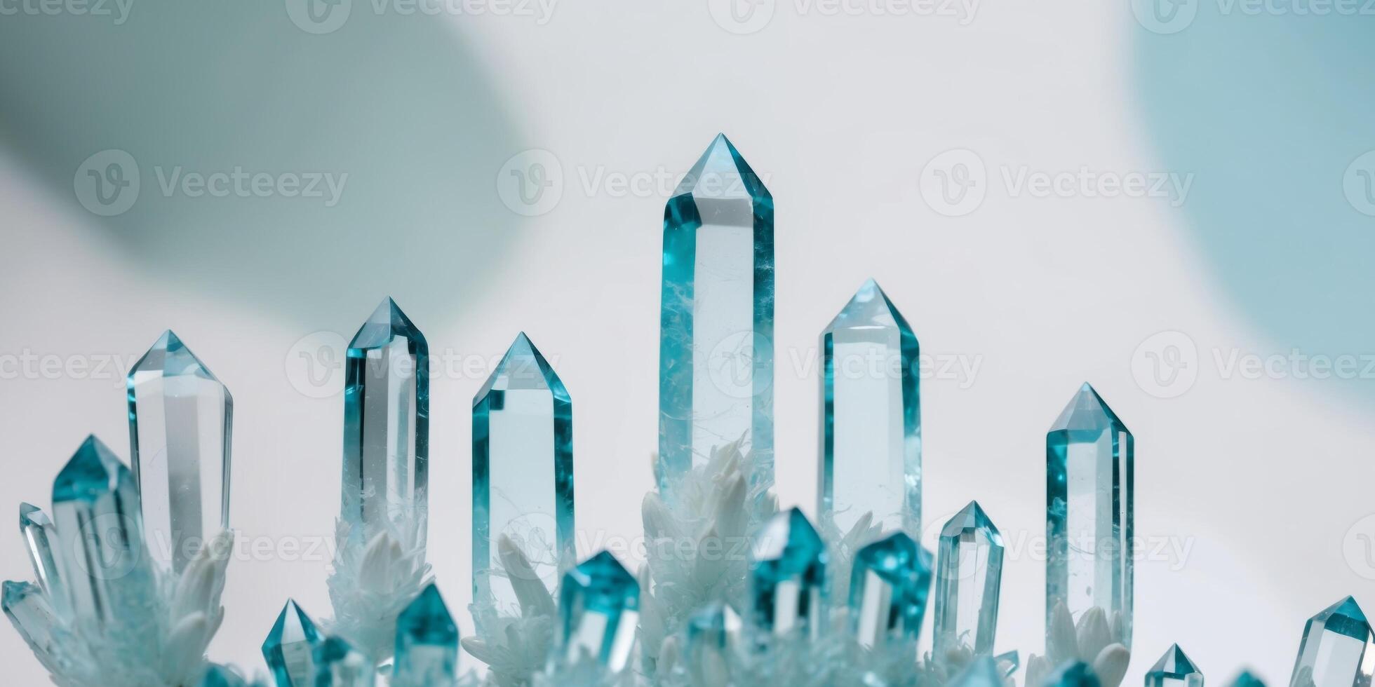 Closeup of aquamarine crystals growing upwards with a blurred background. photo