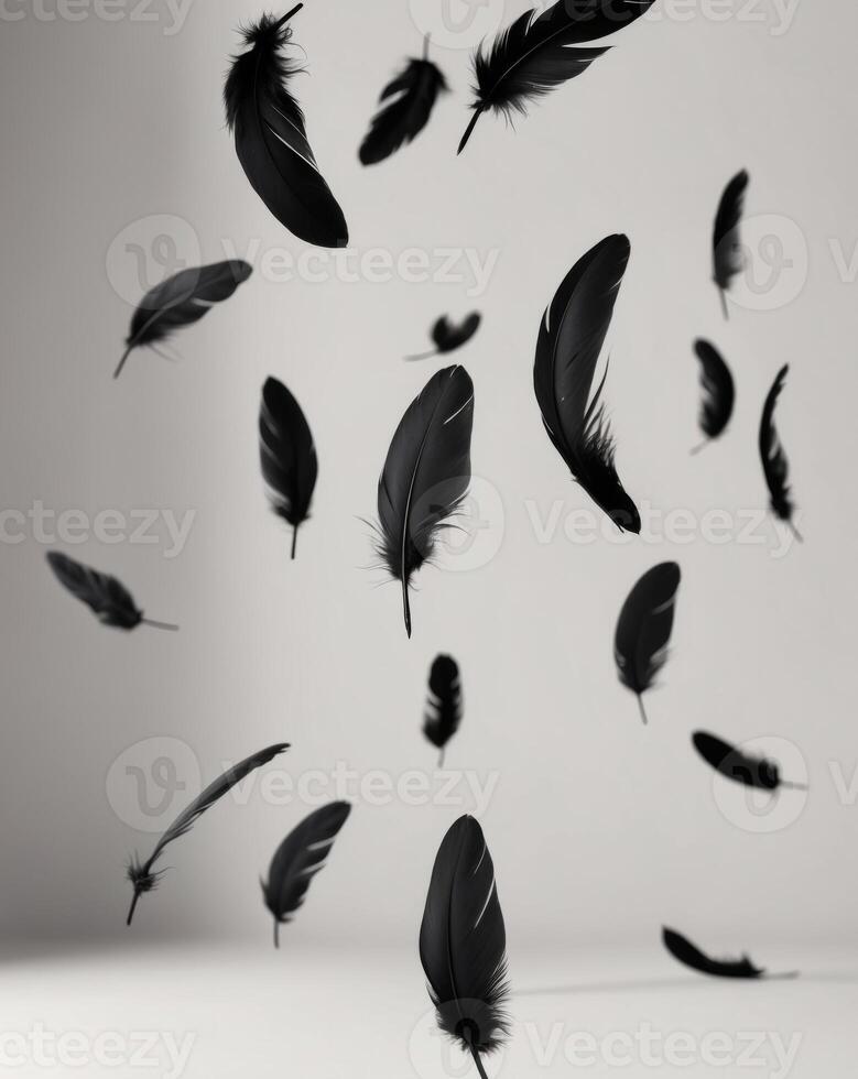 floating black feathers create serene and elegant atmosphere in this image. photo