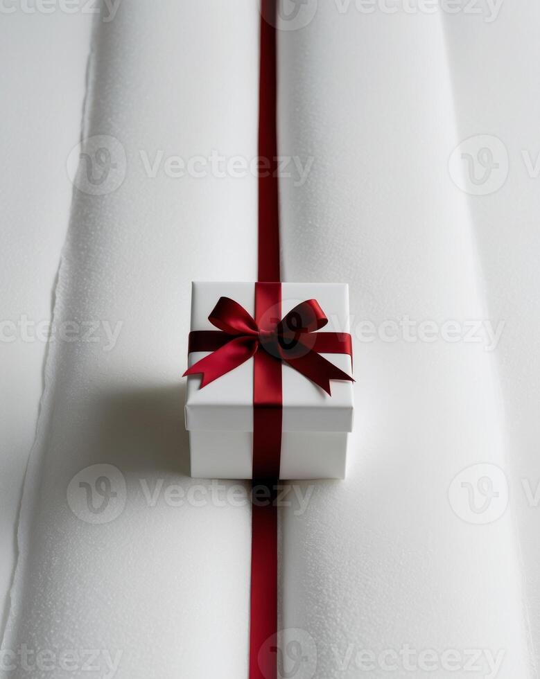 gift box with red ribbon on white insulating background. photo
