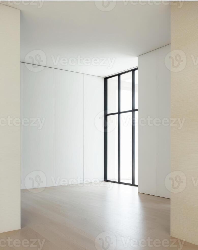 A large living room with a white wall and a large window photo