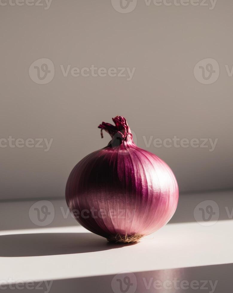 The purple luster of the onion skin shines brightly in the sunlight photo