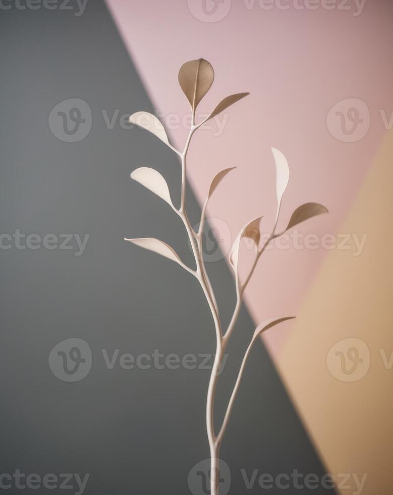 abstract art with organic shapes and a leafy branch in shades of grey black pink orange and yellow photo