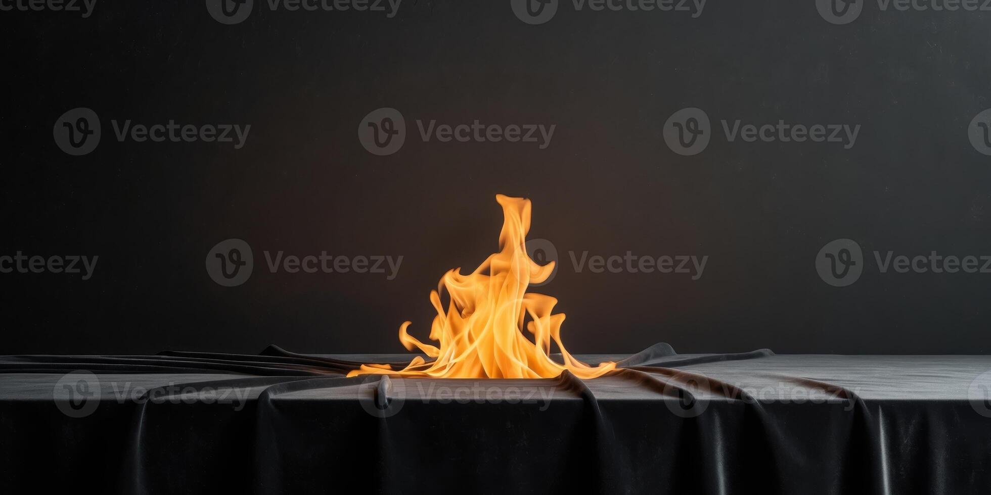 The fiery burning flame on a black background photo