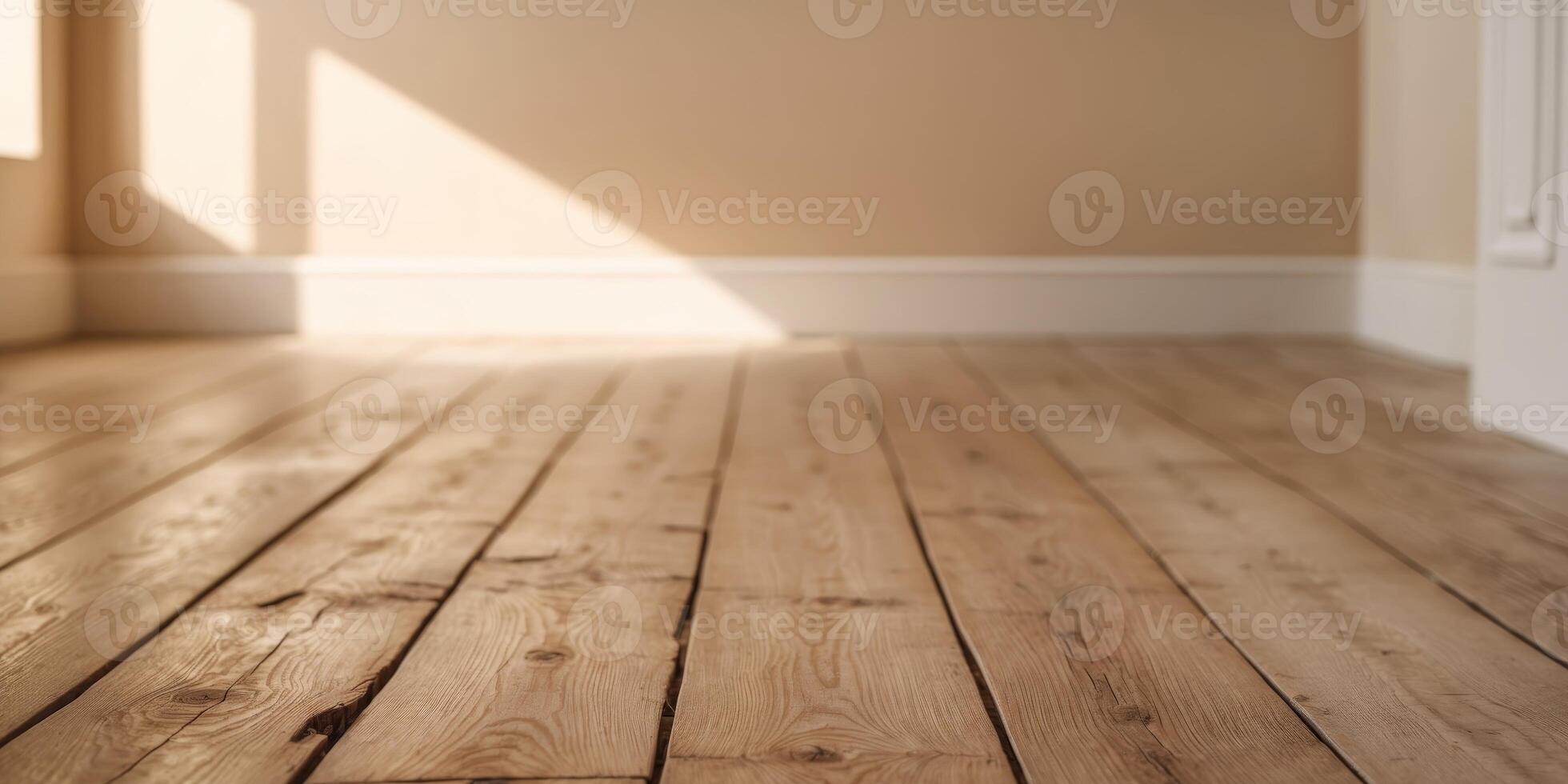 A room with a wooden floor and white walls photo