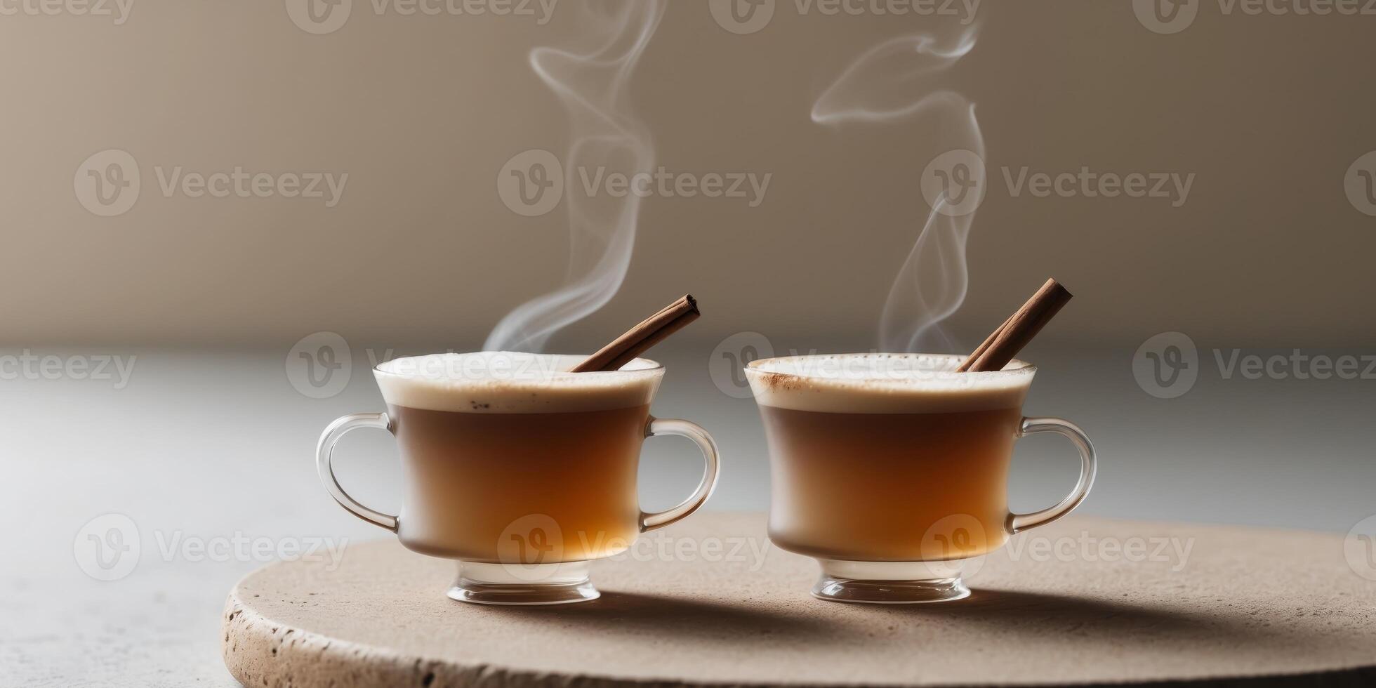 Two Glasses of Creamy Spiced Tea Beverage photo