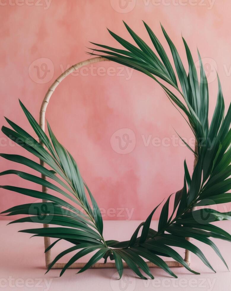 Tropical Palm Leaves Frame on Pink Background photo