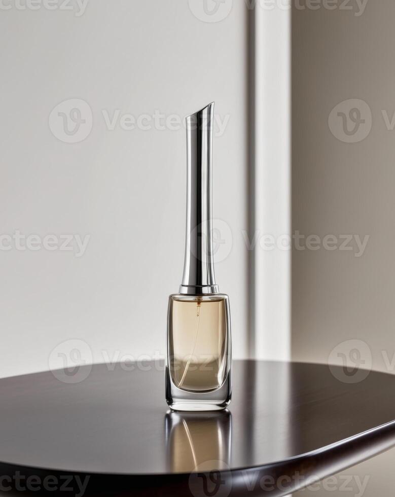 A bottle of perfume sitting on top of a table photo