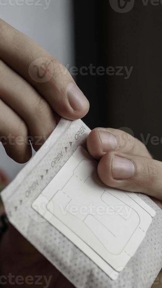 The Process of Applying a Skin Patch Designed for Health and Wellness Benefits and Improvements photo