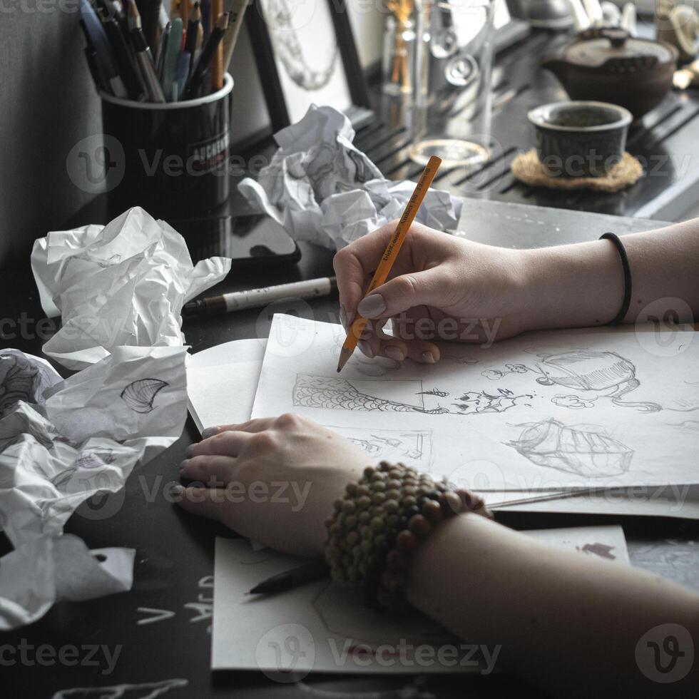 A Creative Workspace that includes a variety of Sketching and Design Materials for artists photo