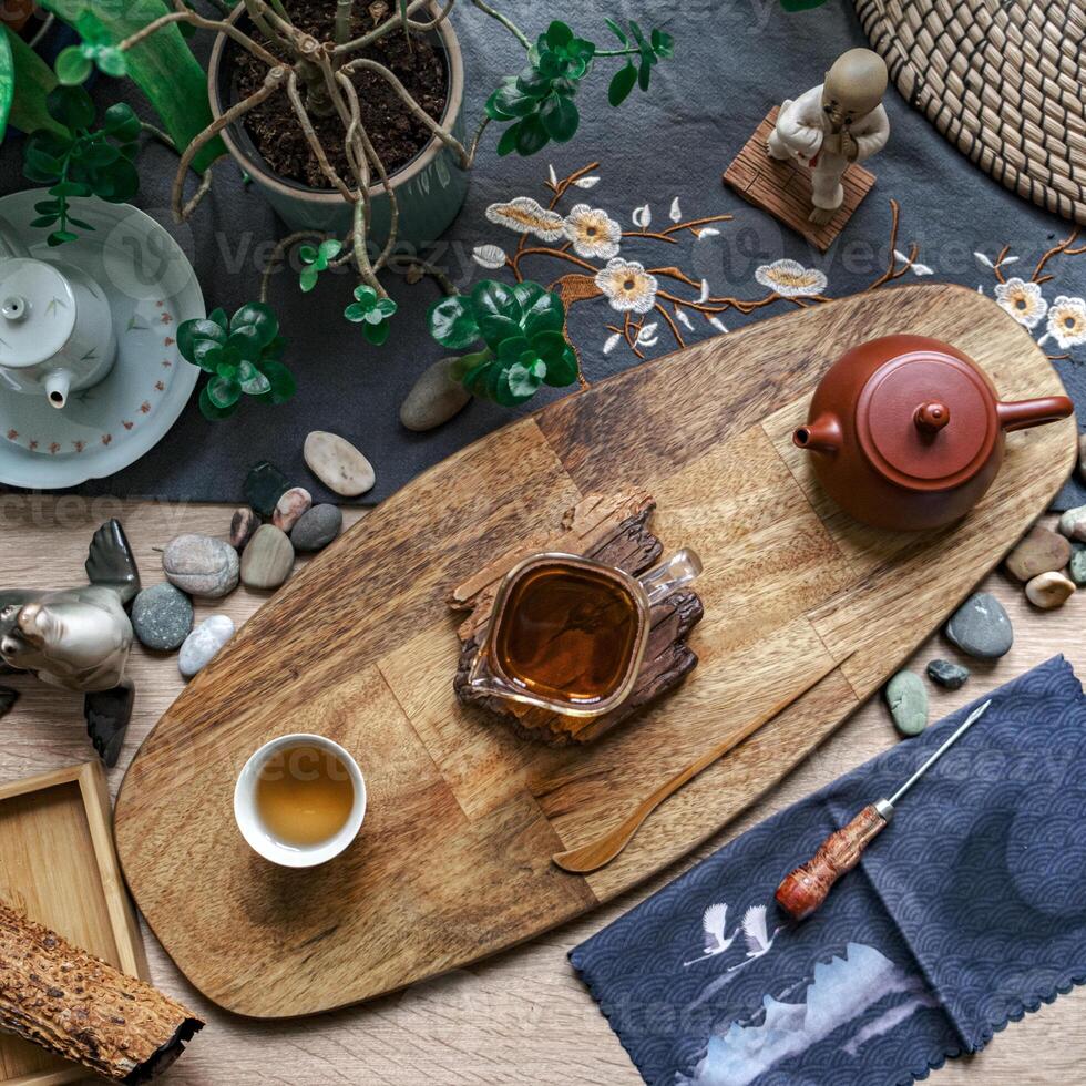 An Elegant and Serene Tea Ceremony Setup Featuring Natural Decor along with Beautiful Teaware photo