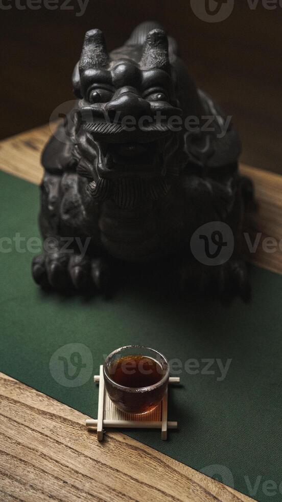 This is an Elegant Oriental Tea Set complete with a beautiful Guardian Lion Statue photo