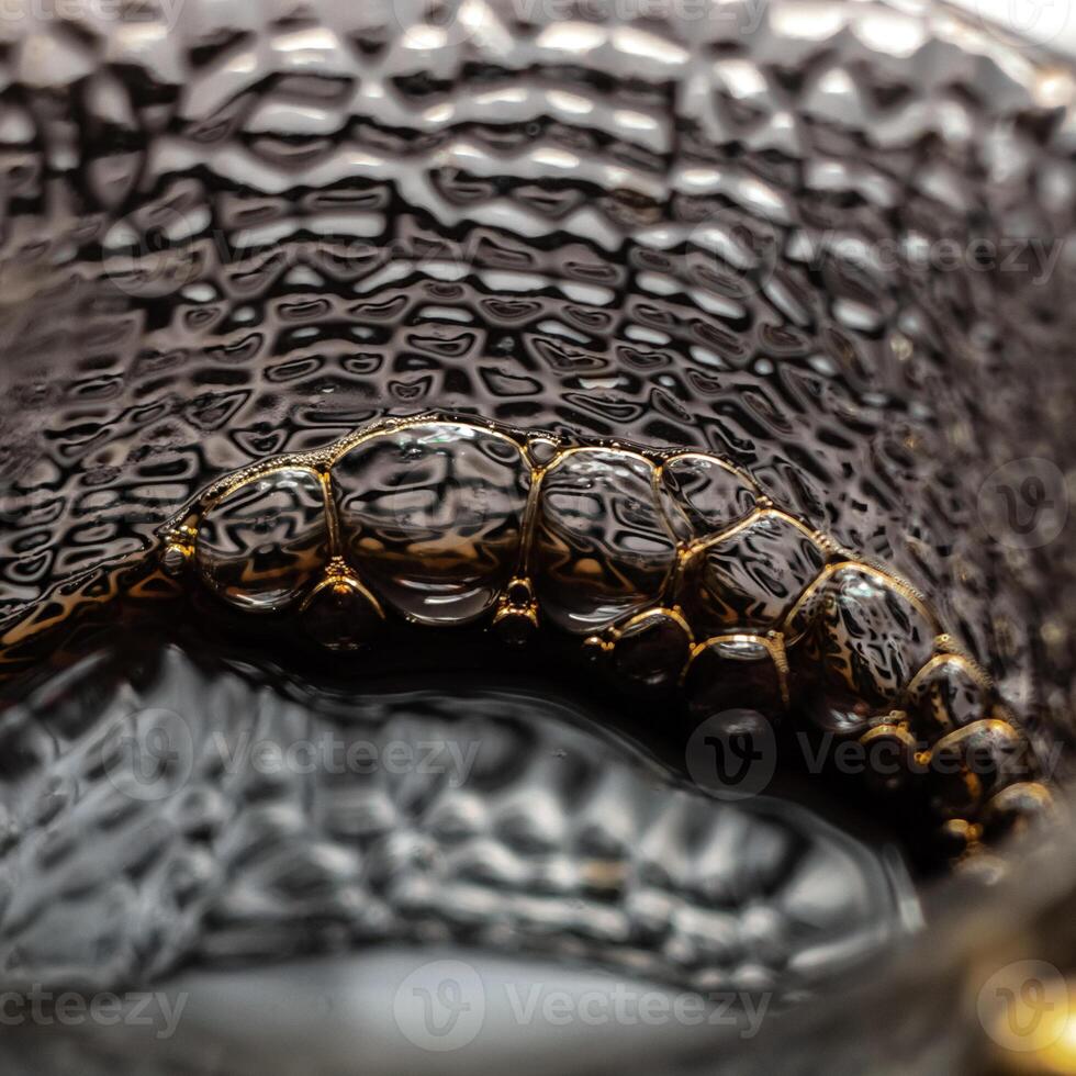 A CloseUp Image of Textured Glass Featuring Unique and Intricate Patterns and Design photo