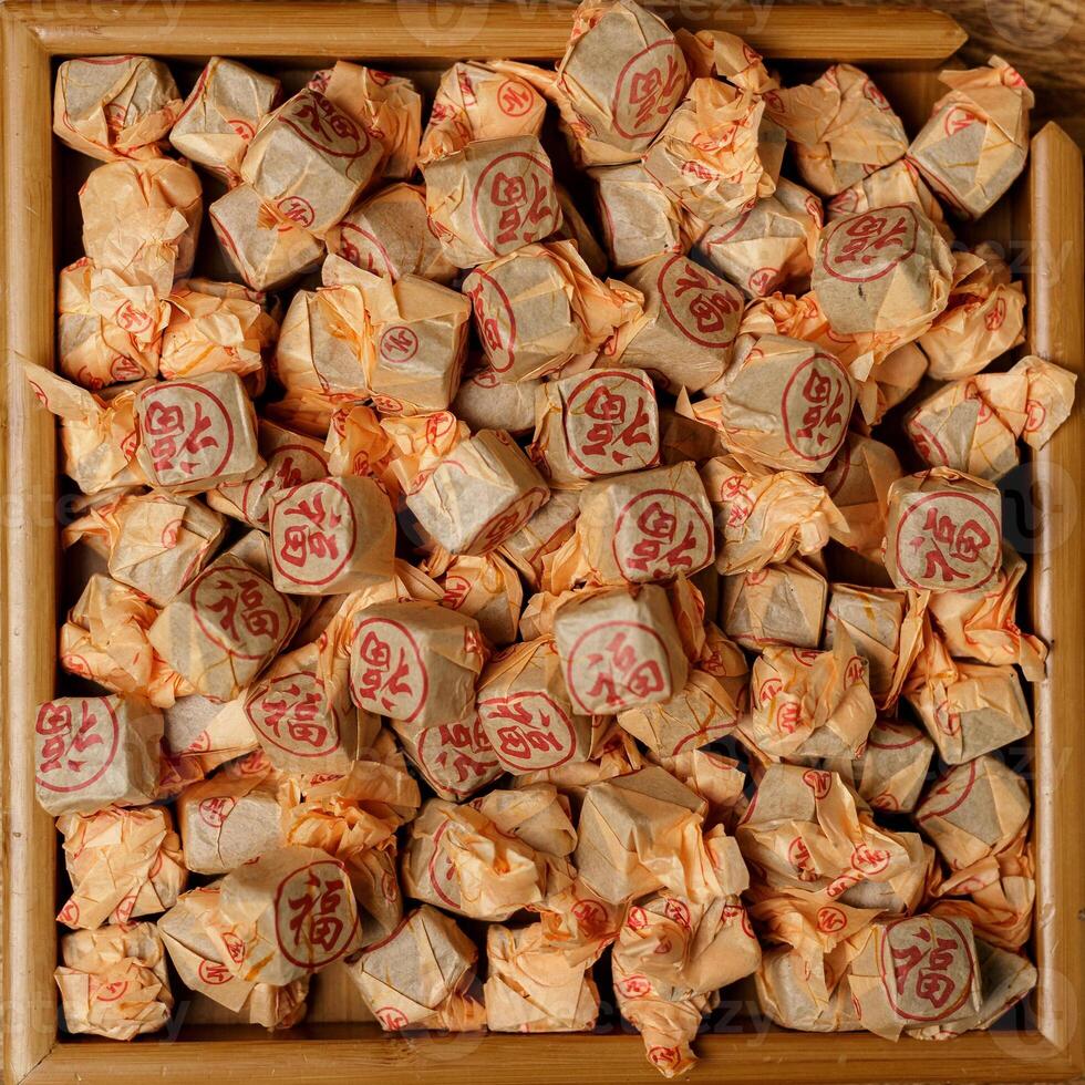 A Vibrant and Colorful Collection of Beautifully Wrapped Candies for Everyone to Enjoy photo