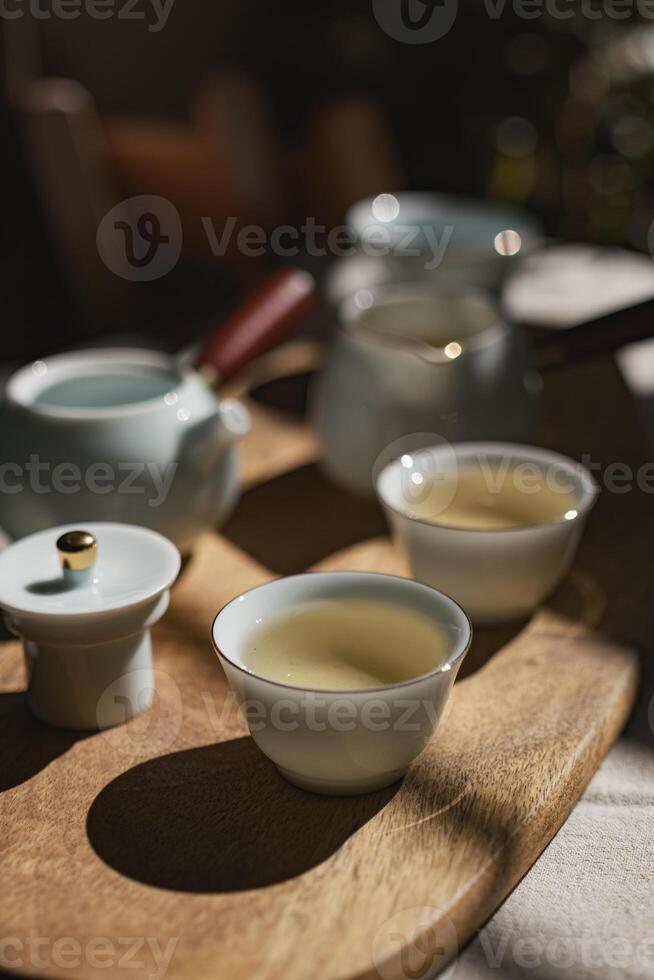 An Exquisite Tea Set Display with Beautifully Crafted Cups and an Elegant Teapot photo