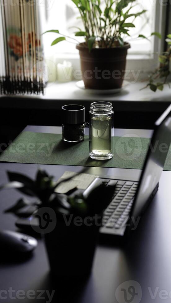 A Modern Workspace Featuring Beautiful Plants and Lush Greenery to Create a Comfortable Atmosphere photo