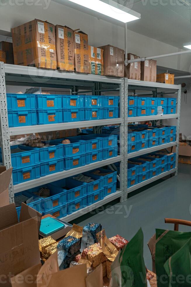 An Organized Storage Area featuring WellArranged Bins and Boxes for Optimal Use of Space photo