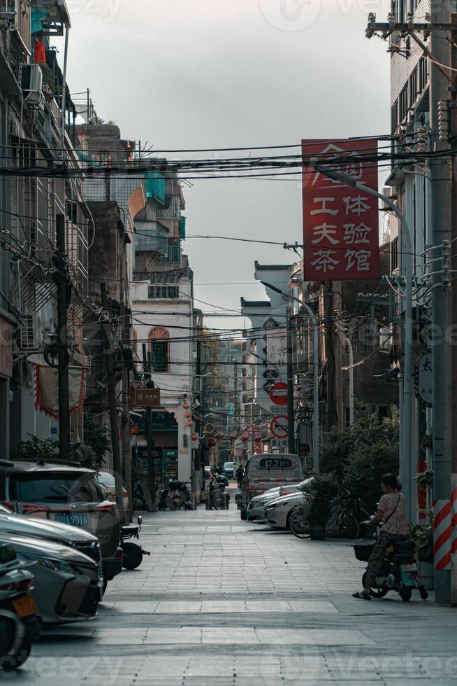 A Quiet Street Scene Set in a Dynamic and Vibrant Urban Environment with Unique Features photo