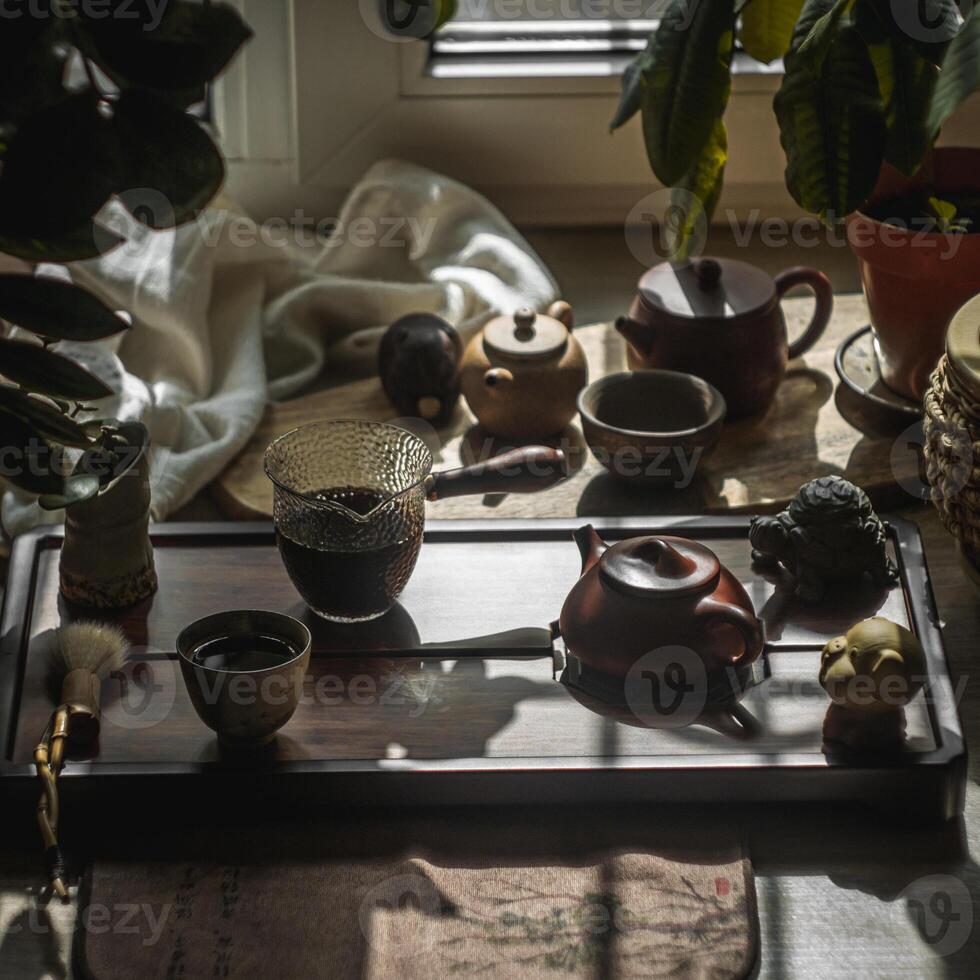 An Elegant Tea Setup Featuring a Beautiful Ceramic Teapot Bathed in Soft Natural Light photo