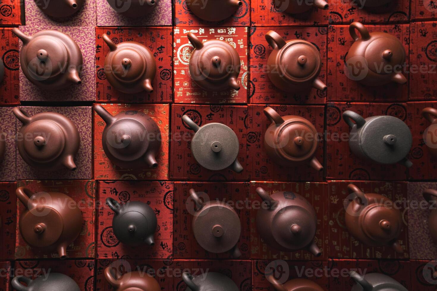Artistic and Unique Arrangement of Traditional Tea Pots for an Inviting Aesthetic Display photo