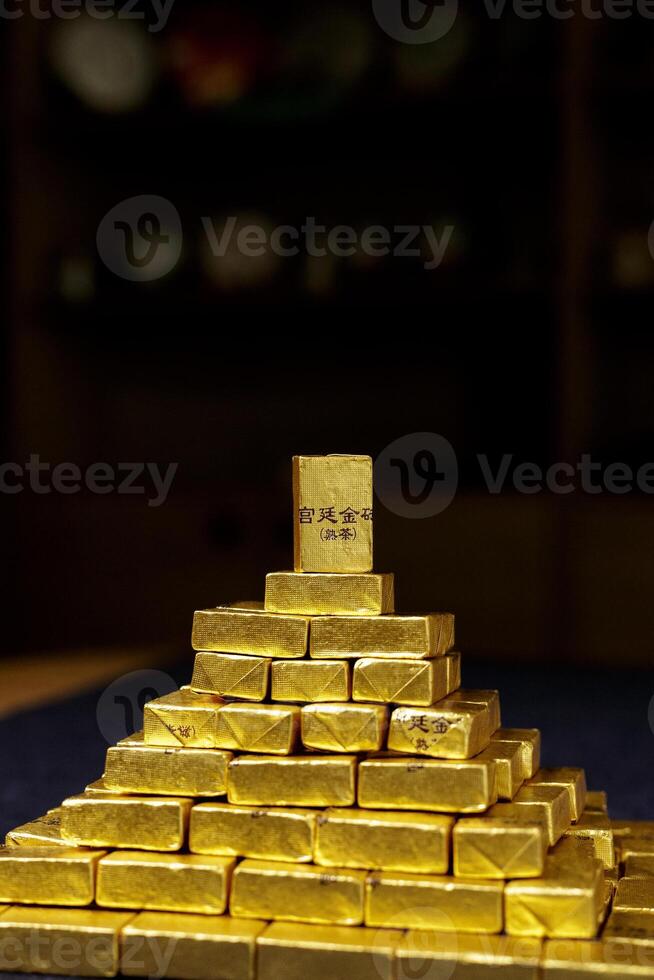 A Spectacular Golden Pyramid Built from Glimmering Bullion Bars Symbolizing Wealth and Prosperity photo
