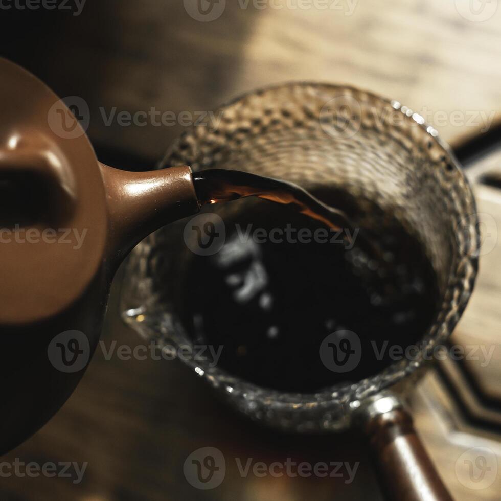 Steaming Brew The Intricate Art of Pouring Tea in a Traditional Teapot for All Occasions photo
