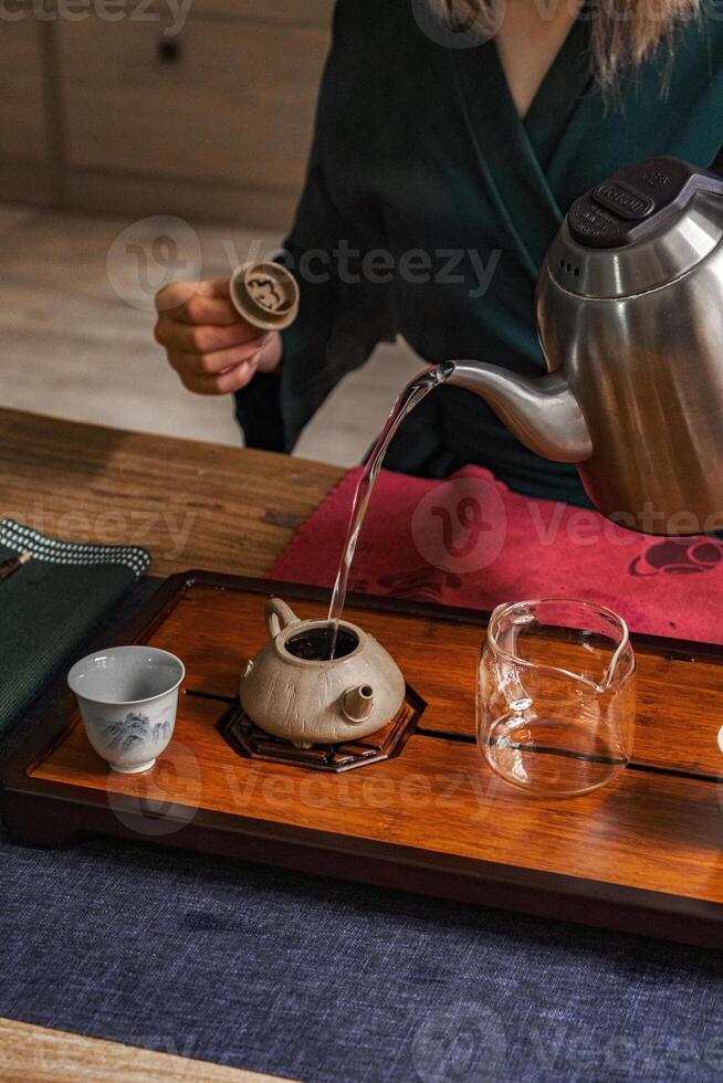 Experience the elegance and art of the traditional tea brewing ceremony with a classic teapot photo