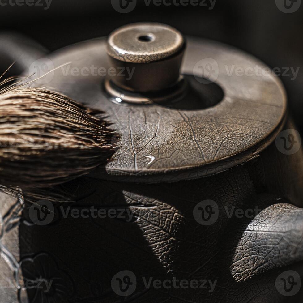 This intricate teapot features a unique pattern and texture, enhancing any decor photo
