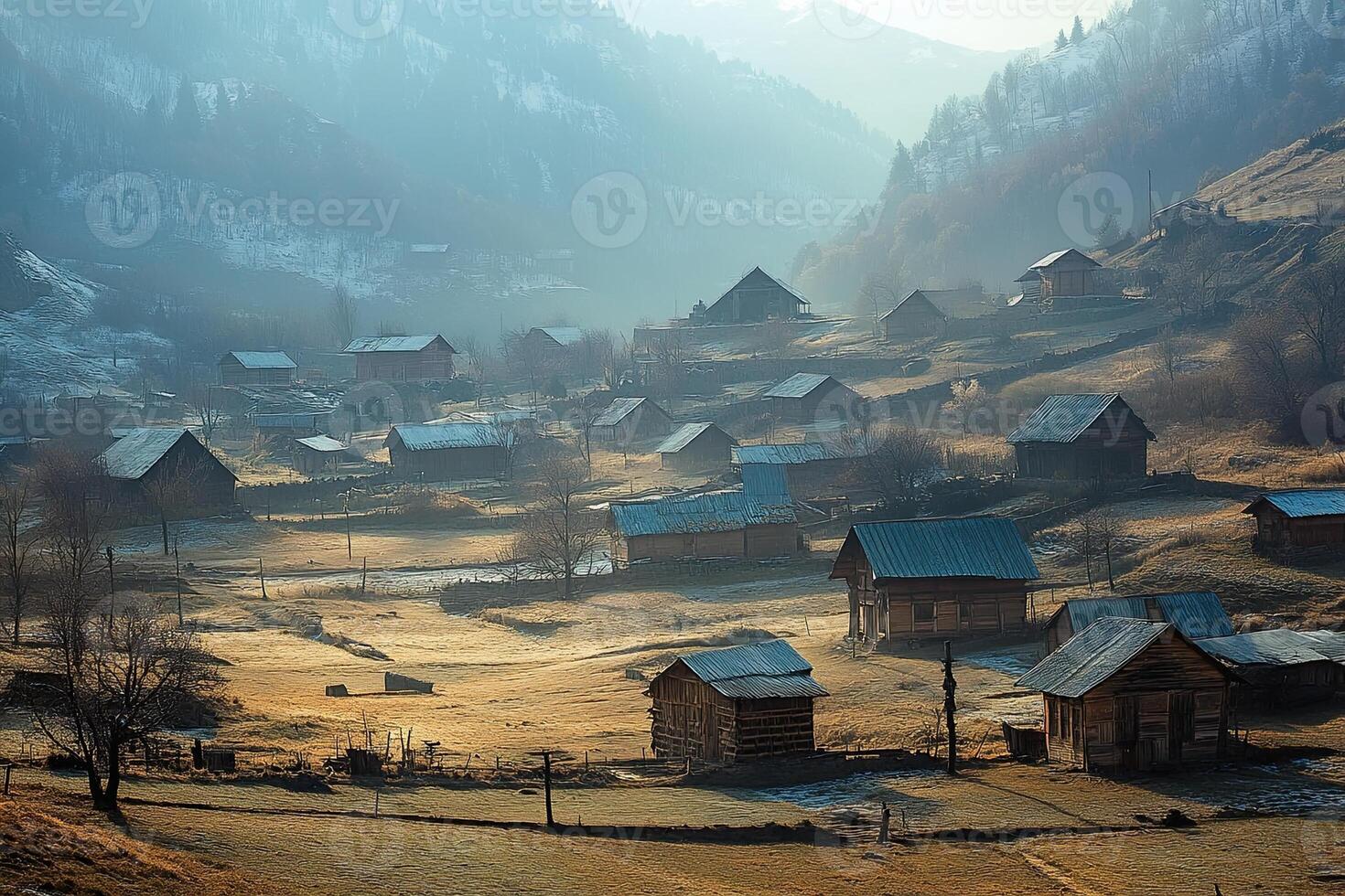 Misty mountain village at sunrise. photo