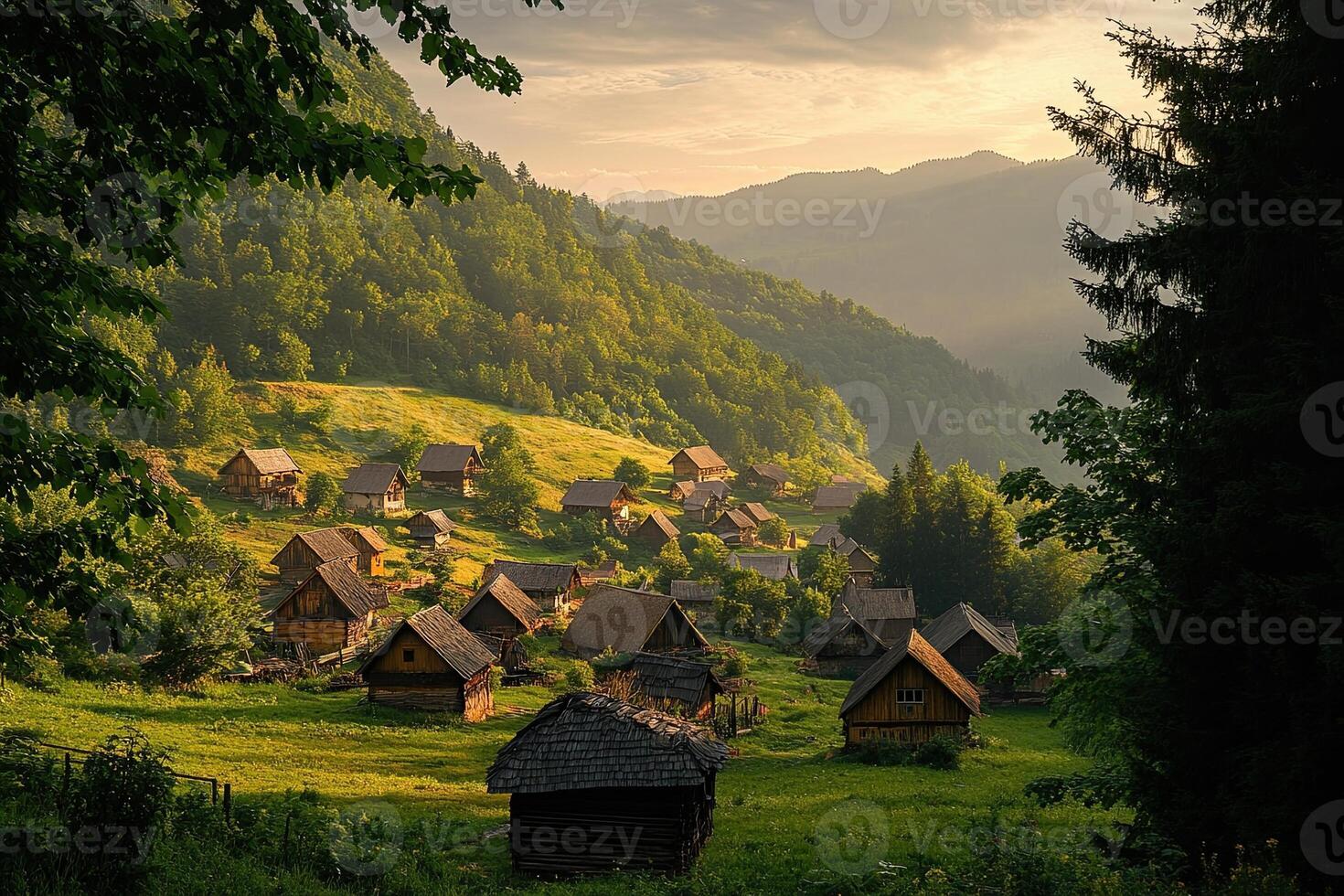 Sunlit mountain village nestled in green valley. photo