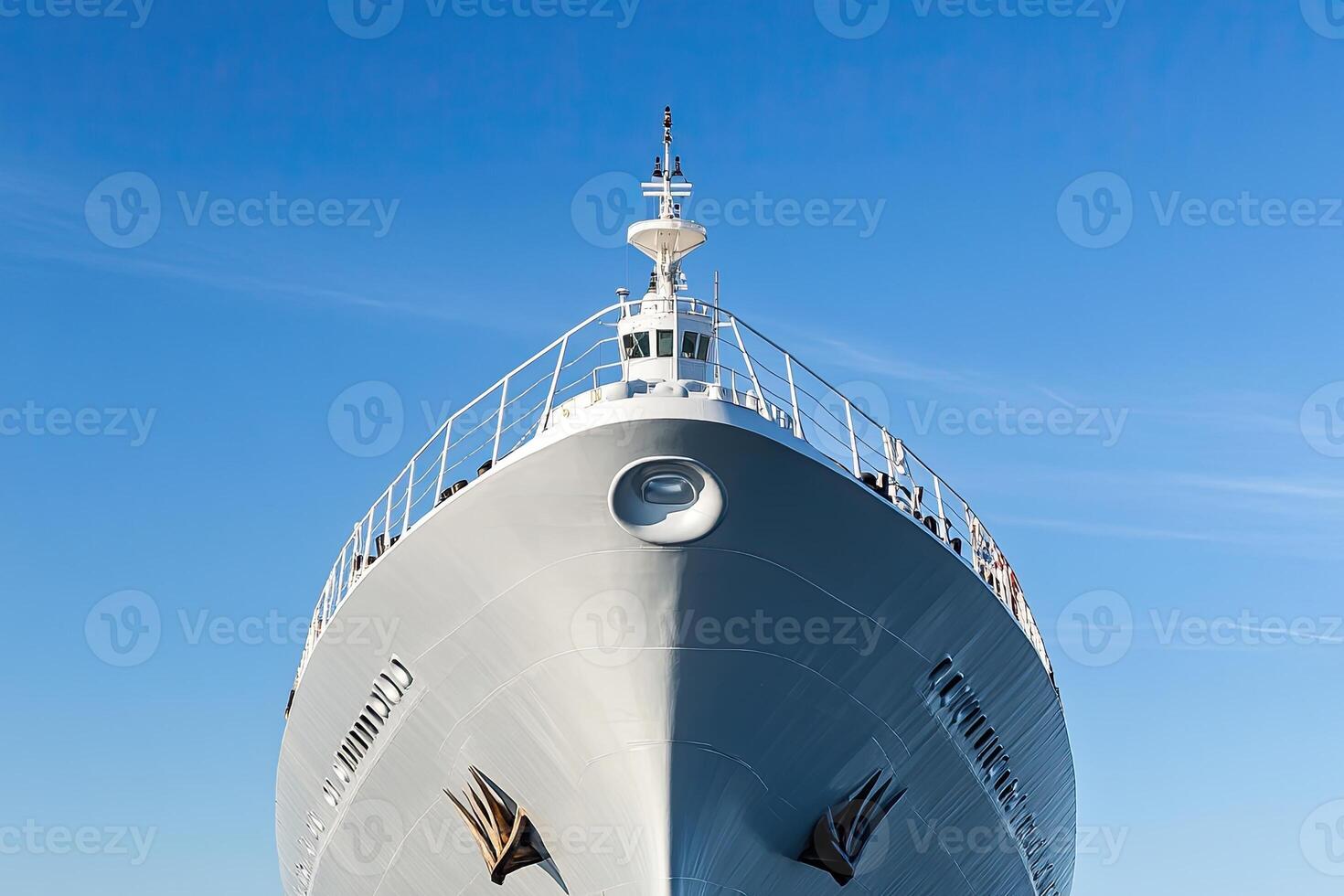 A large ship's bow against a clear blue sky. photo
