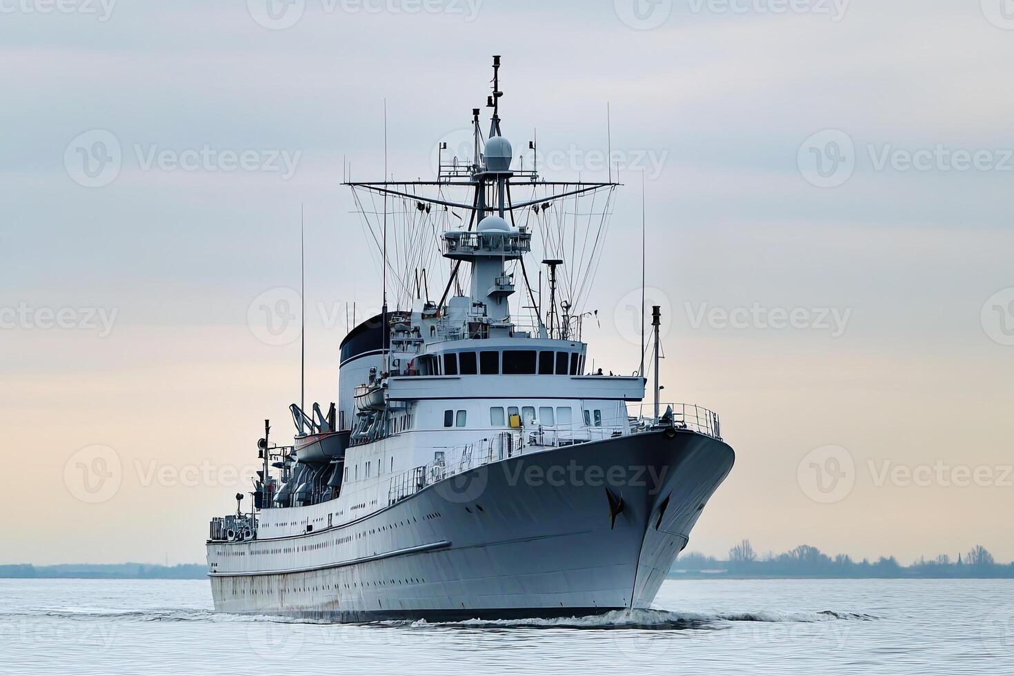 A large ship navigating calm waters under a cloudy sky. photo