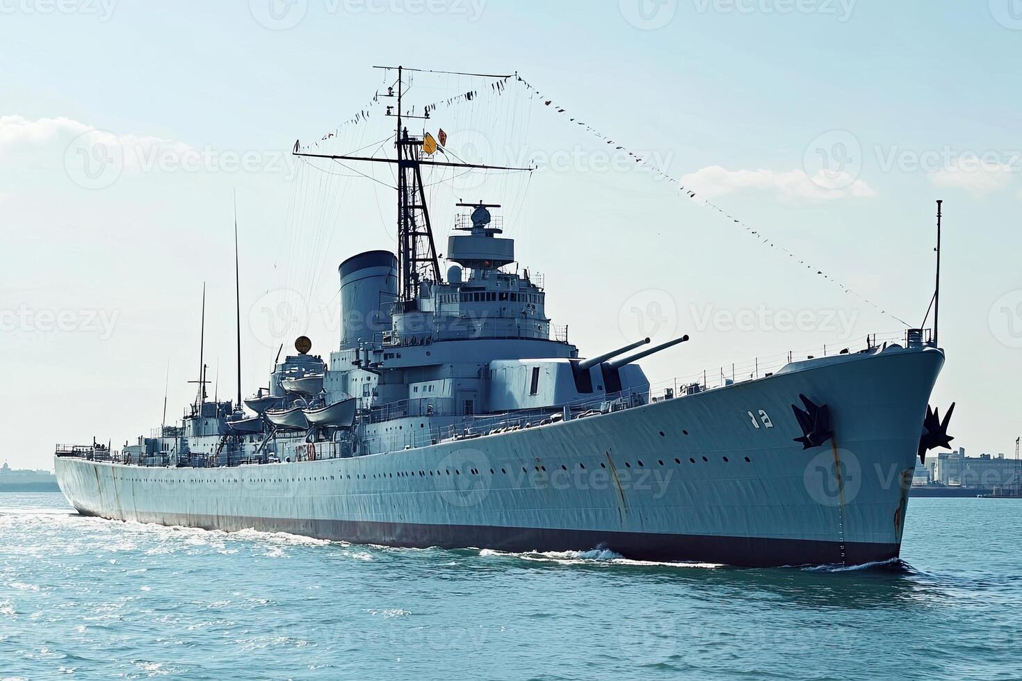 A battleship sailing through calm waters. photo