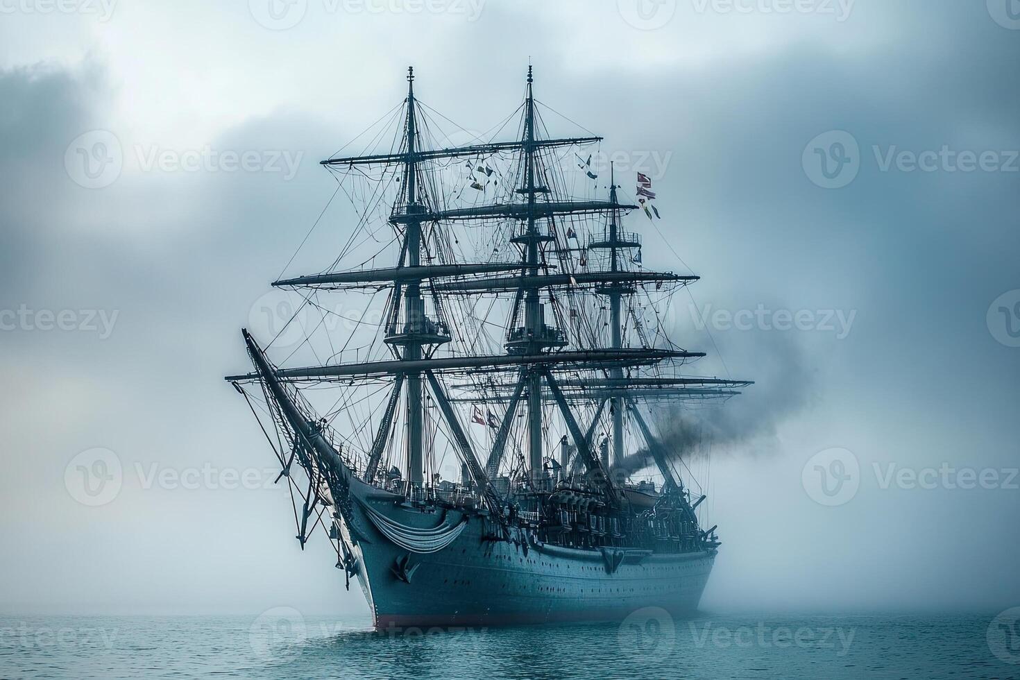 A majestic ship navigating through foggy waters. photo