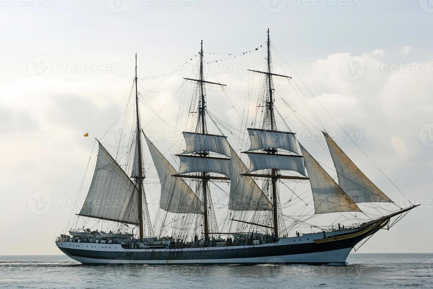 A majestic sailing ship with multiple masts at sea. photo