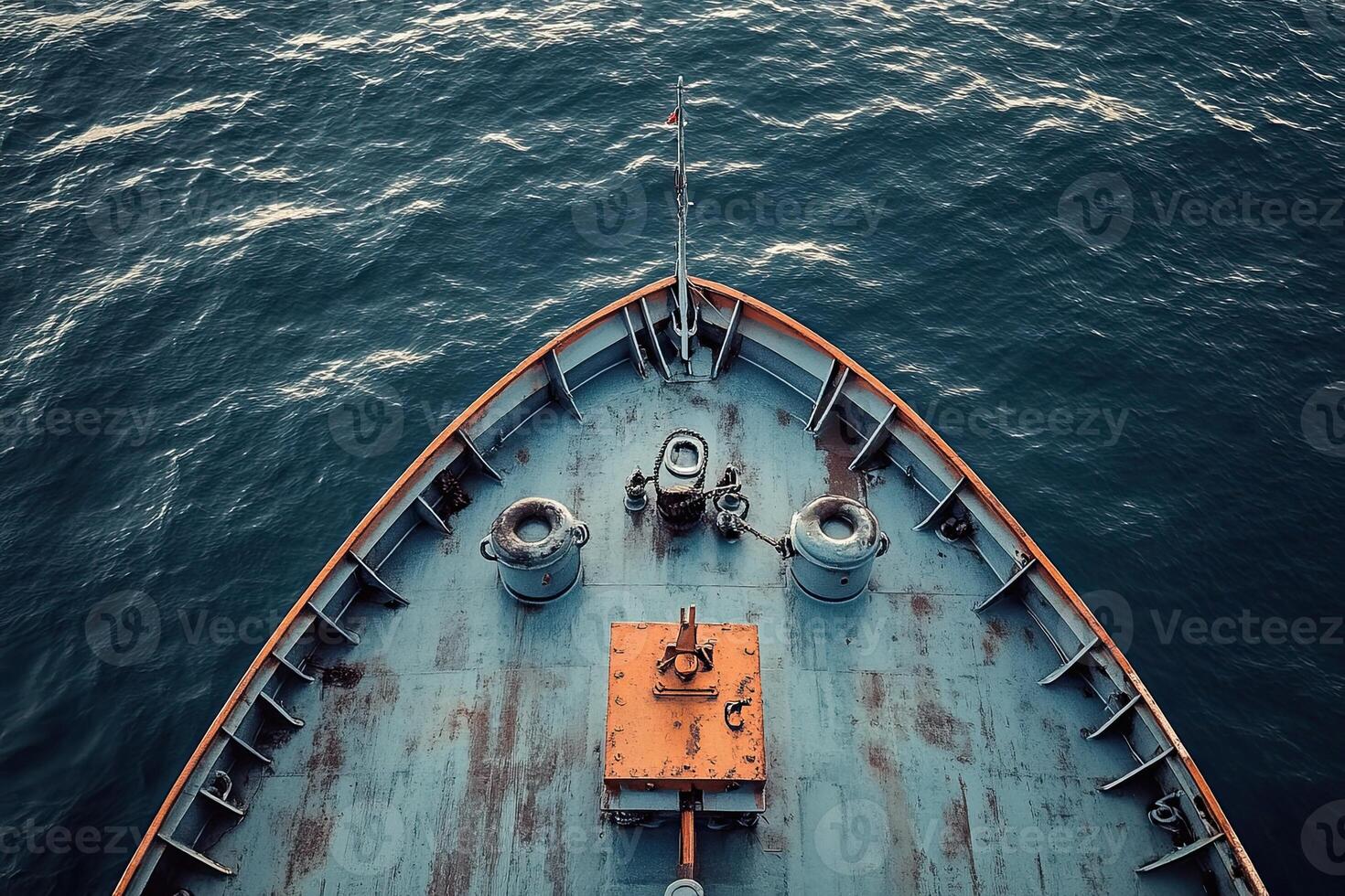 Aerial view of a ship's bow on calm water. photo