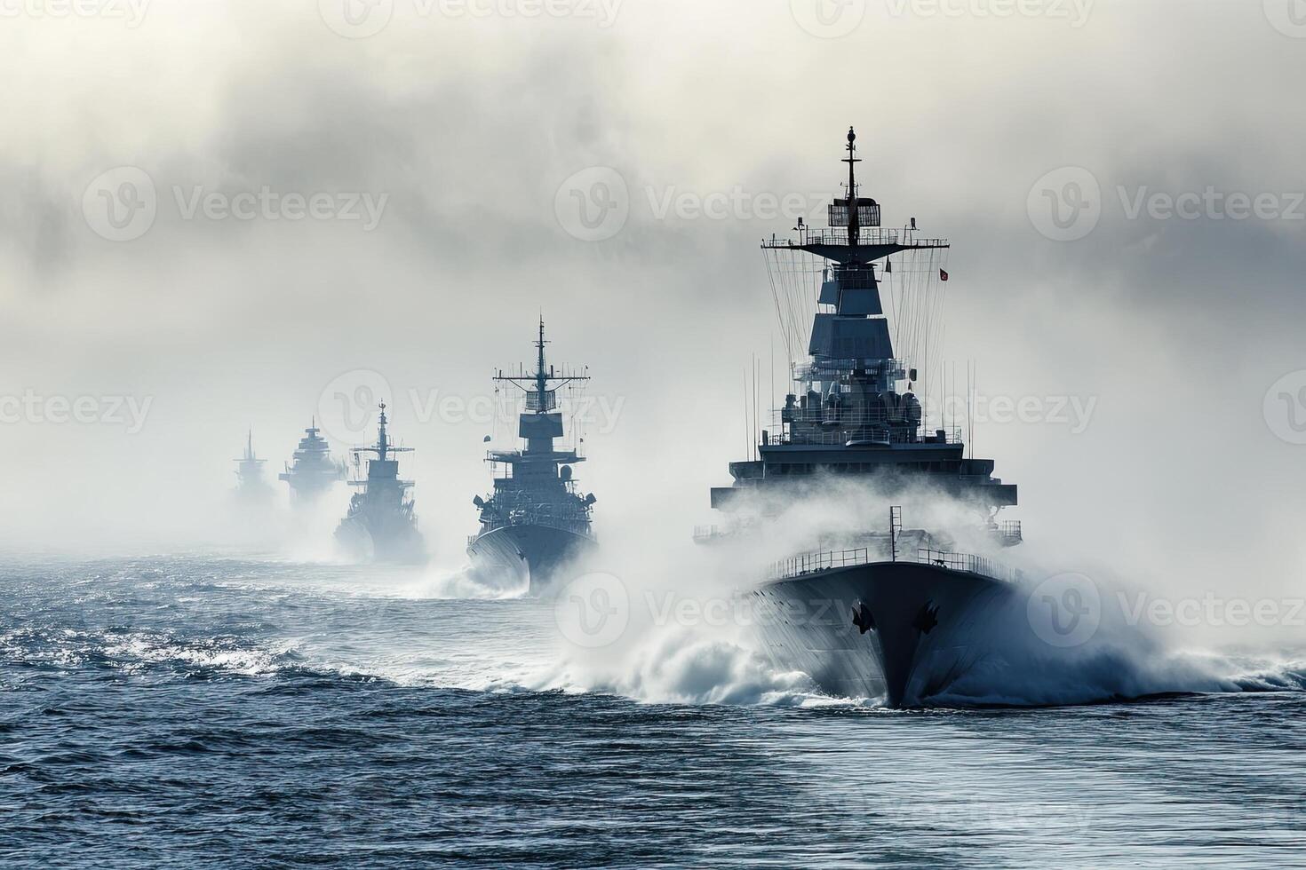 Fleet of warships navigating through misty waters. photo