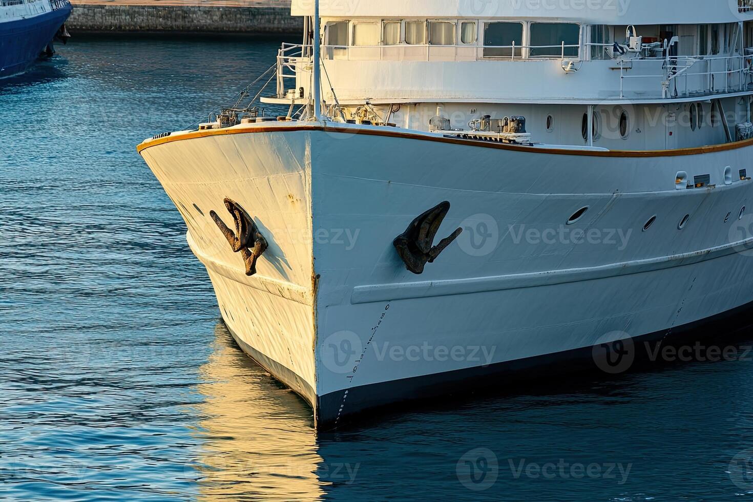 Ship bow with unique figurehead design in harbor. photo