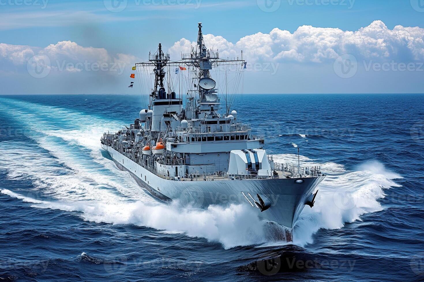 Naval ship navigating through ocean waters. photo
