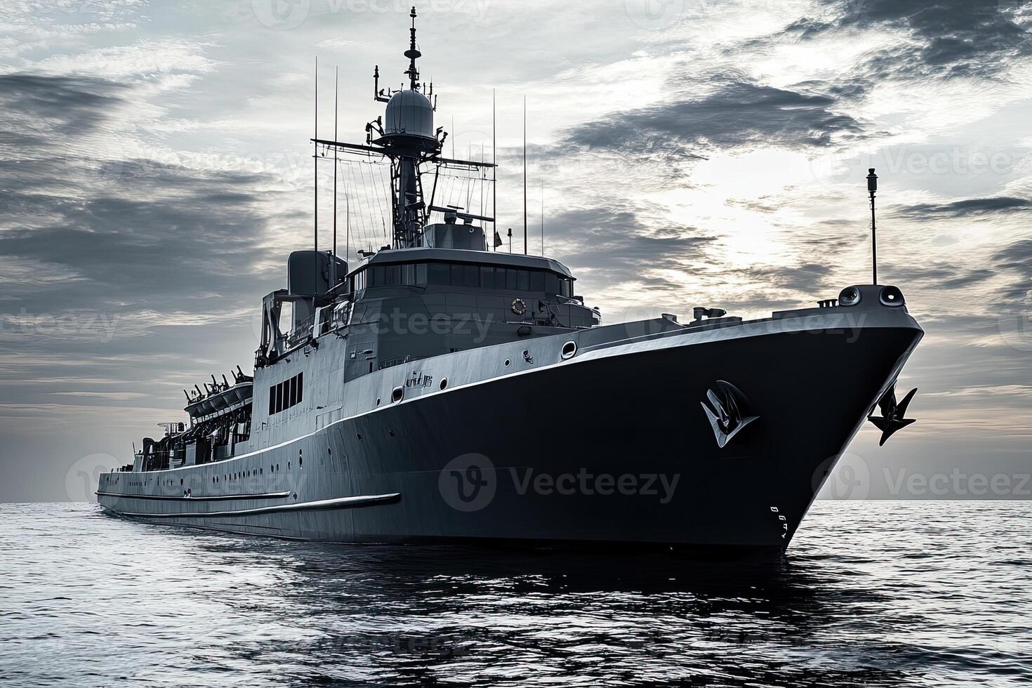 Naval ship on calm waters under a cloudy sky. photo