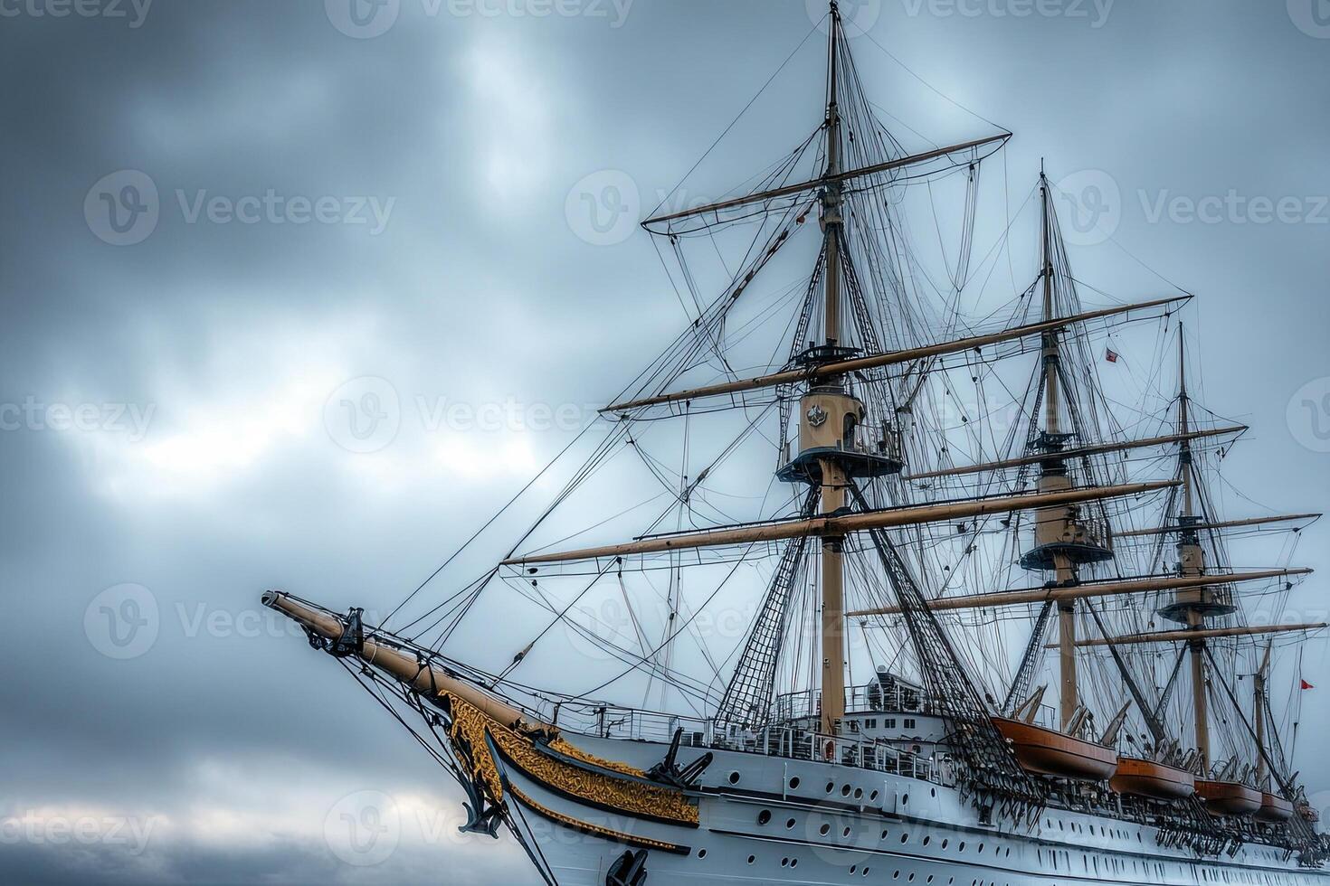 Historic sailing ship under cloudy sky. photo