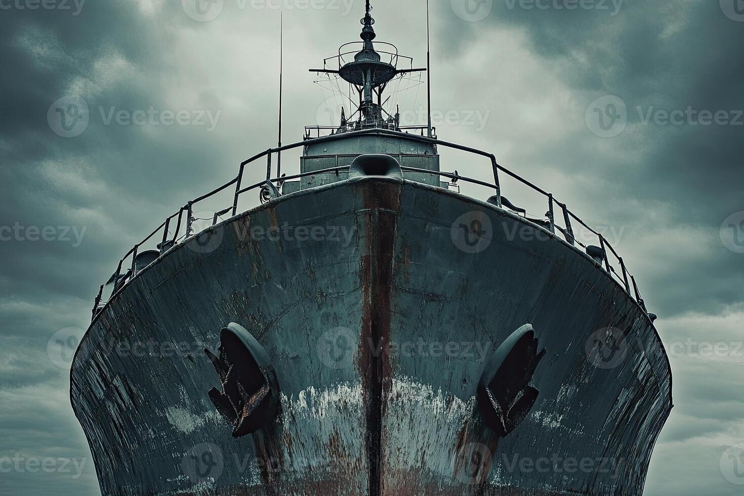 Rusty ship bow against a stormy sky. photo