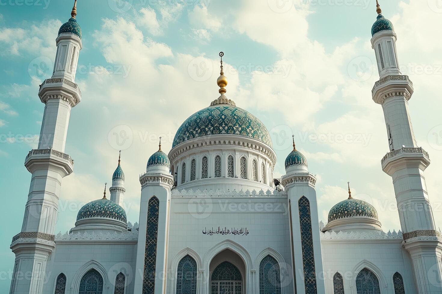 Majestic white mosque under a bright sky. photo