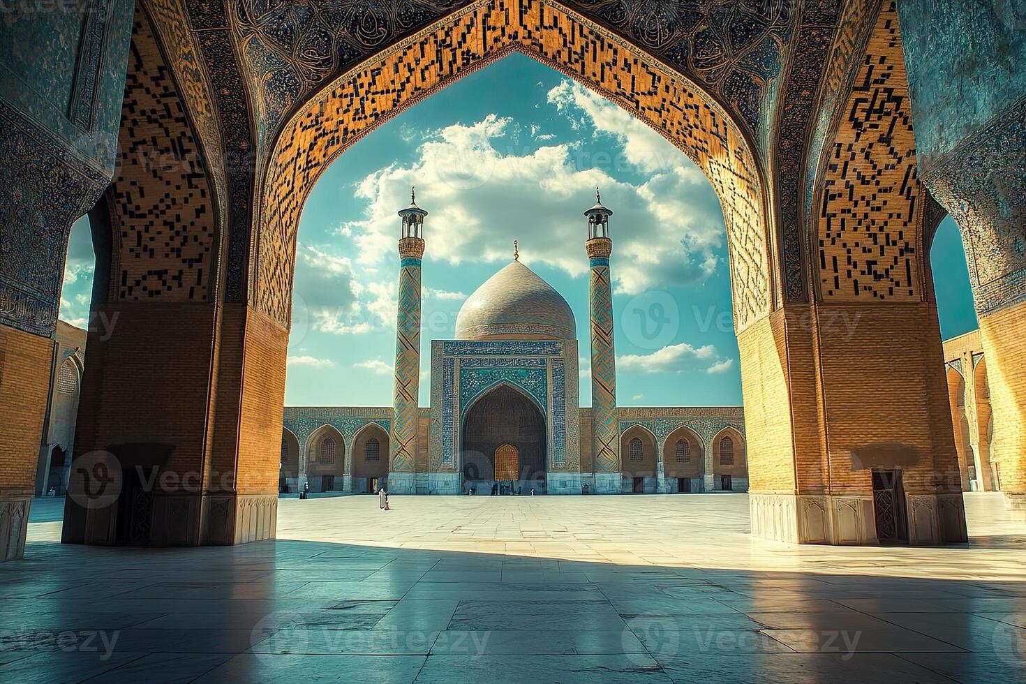 Ornate archway framing a grand mosque under a vibrant sky. photo