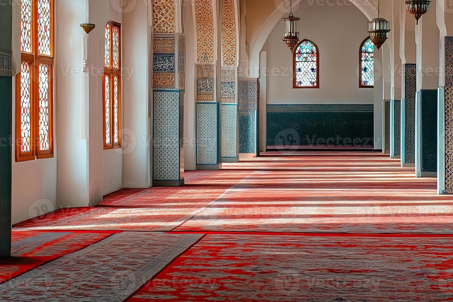Sunlit mosque interior with red carpet, arched hallways, and stained-glass windows. photo